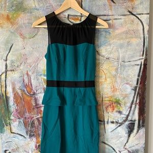 Green peplum dress